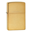 Gold-colored Zippo lighter with a brushed metal finish.
