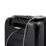 Black suitcase with a built-in USB charging port.