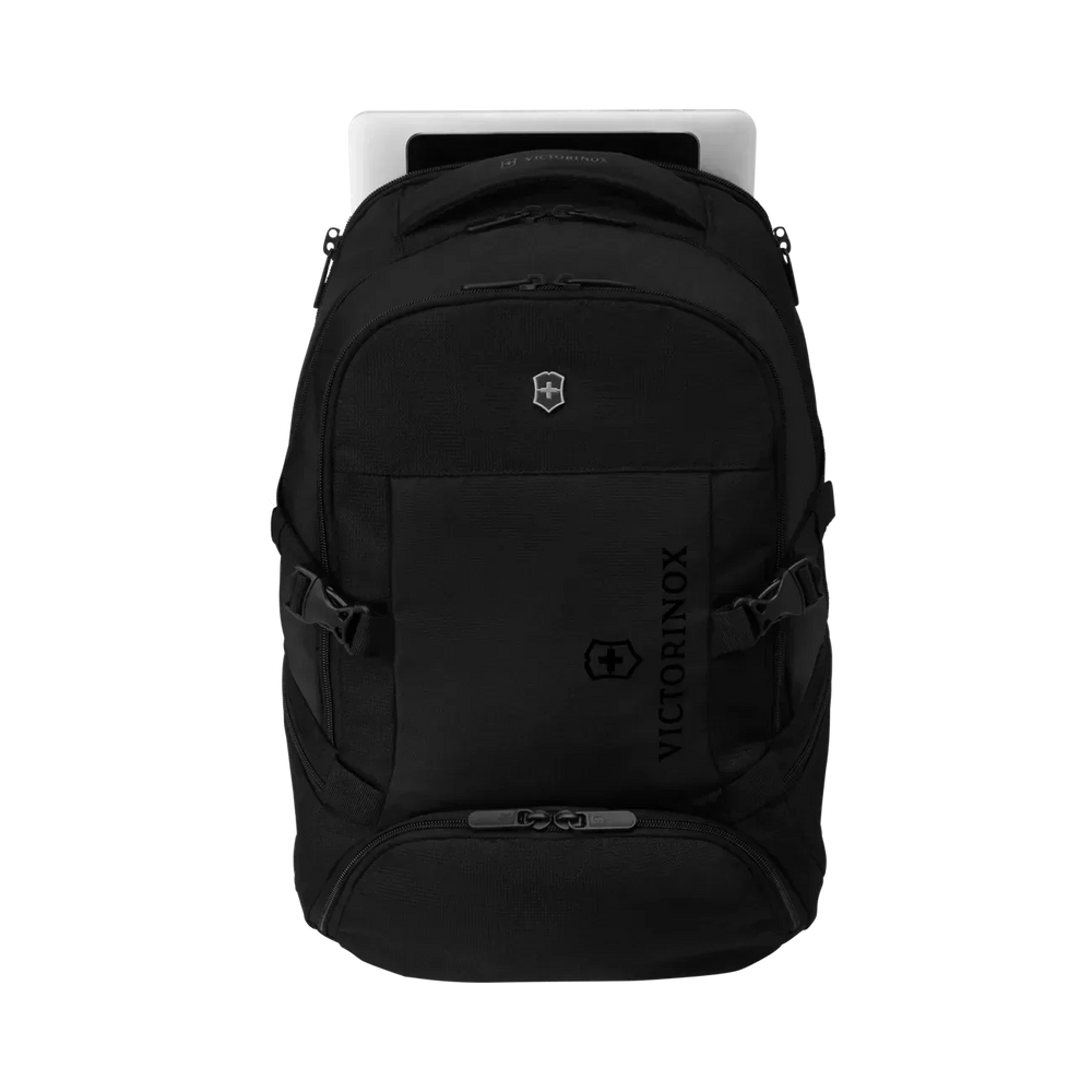 Black backpack with multiple compartments and straps.