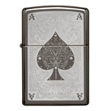 Ornate metal lighter featuring an engraved ace of spades design.
