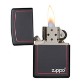 Lit black Zippo lighter with red trim and visible flame.