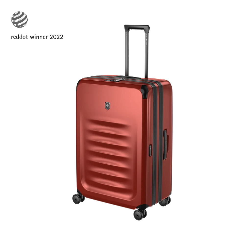 Red hardshell rolling suitcase with horizontal ridges and an extendable handle.