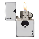 Lit metal lighter designed to resemble an ace of spades playing card.