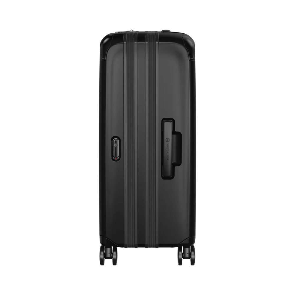 Black hardshell rolling suitcase with vertical ridges and a side handle.