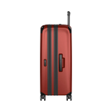 Red hardshell suitcase with black trim and wheels.