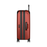 Red hardshell suitcase with black trim and wheels.