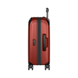 Red hardshell rolling suitcase with black trim and wheels.