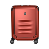 Red hardshell rolling suitcase with horizontal ridges on the front panel.