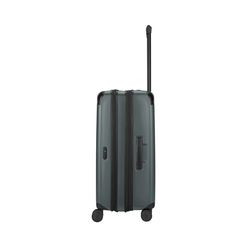Dark gray hardshell rolling suitcase with an extendable handle and wheels.