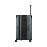 Gray hardshell rolling suitcase with an extendable handle.
