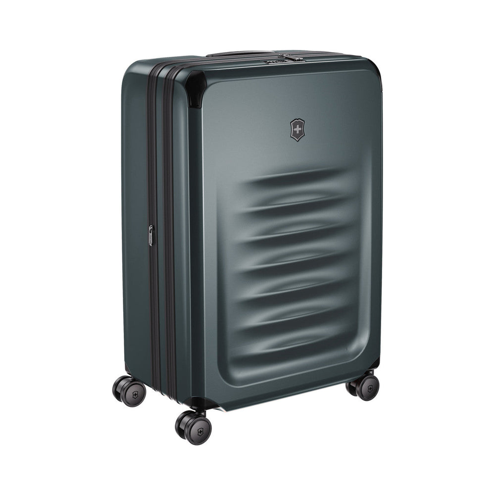 Dark gray hardshell rolling suitcase with horizontal ridges on the front panel.