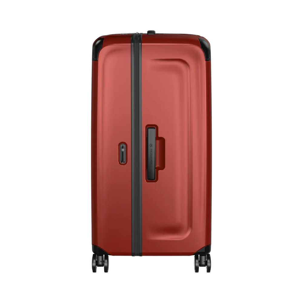 Red hardshell rolling suitcase with black trim and wheels.