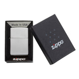 Zippo lighter in its packaging box.