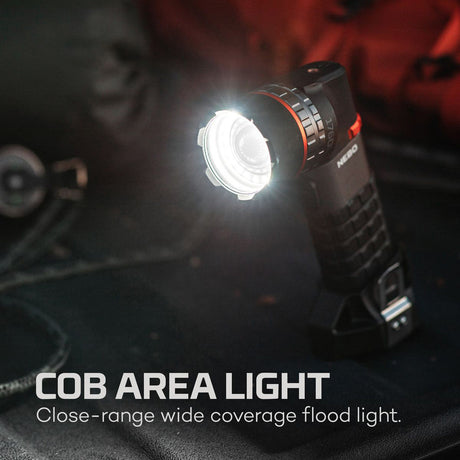 Handheld COB area light with a bright, wide-beam illumination.