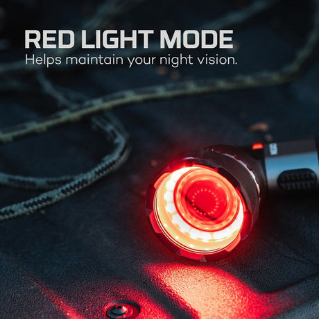 Circular red light or lamp emitting a bright glow.