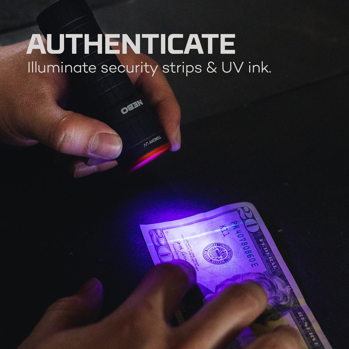Ultraviolet light device illuminating security features on a banknote.