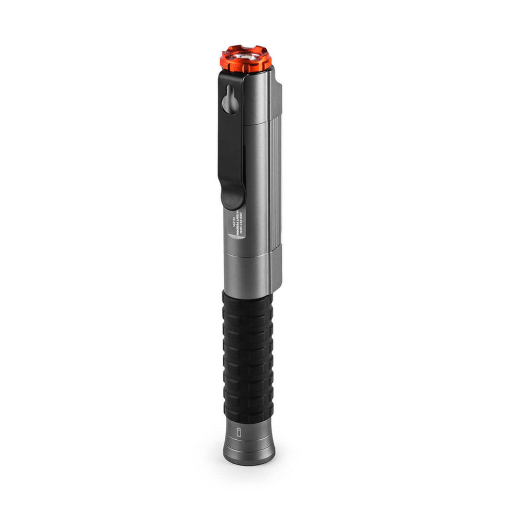 Cylindrical metallic tool with a black grip and orange top, resembling a torque wrench or precision instrument.