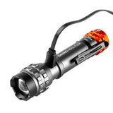 Handheld tactical flashlight with adjustable focus and orange accents.