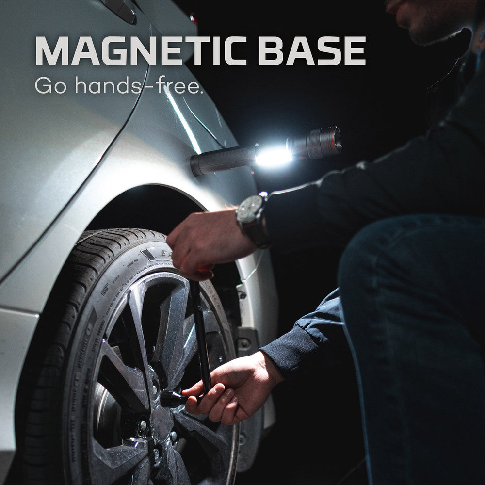 Magnetic base work light for hands-free illumination during automotive tasks.