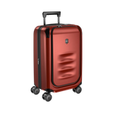 Red hardshell rolling suitcase with a retractable handle and wheels.