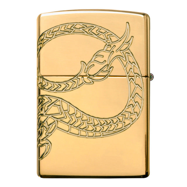 Gold-colored Zippo lighter with an engraved dragon design.