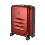 Red hardshell rolling suitcase with horizontal ridges on the front panel.