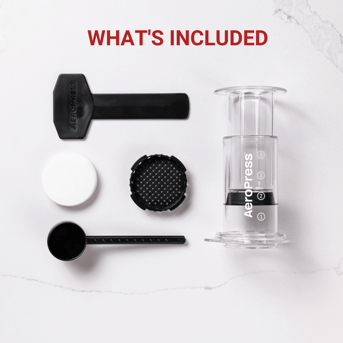 Aeropress coffee maker with its components laid out.