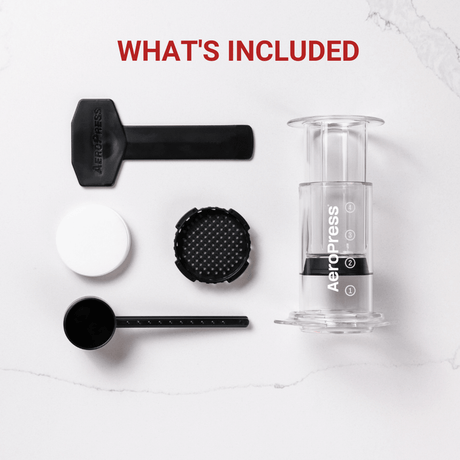 Aeropress coffee maker with its components laid out.