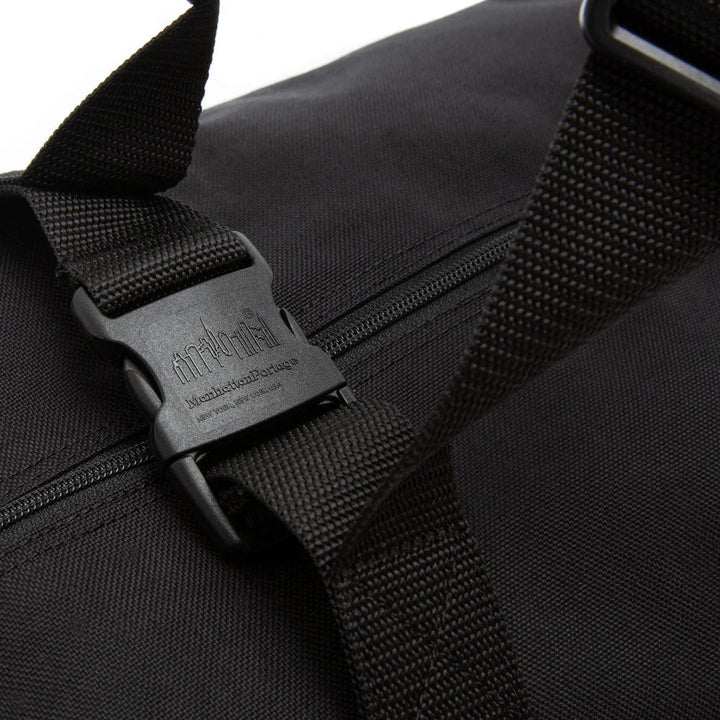 Close-up of a side clip strap on the Manhattan Portage Rockaways Weekender