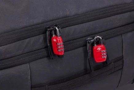 Thule Aion wheeled duffel zip sliders locked together with two combination locks