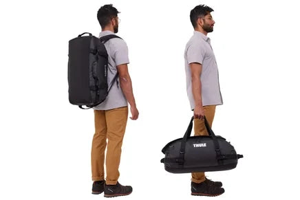 Thule Chasm duffel worn as a backpack and carried by its handles