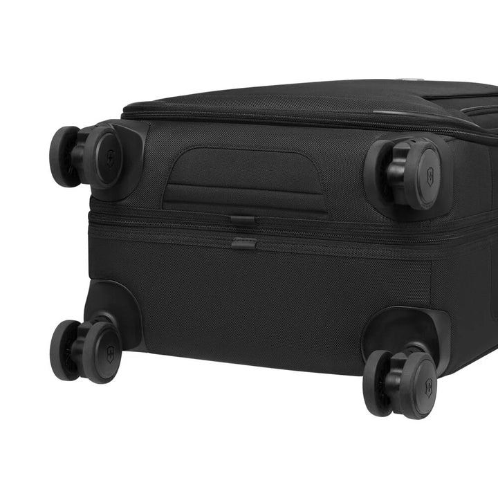 Werks Traveler 7.0 Frequent Flyer Carry-On on its side, showing the eight wheels