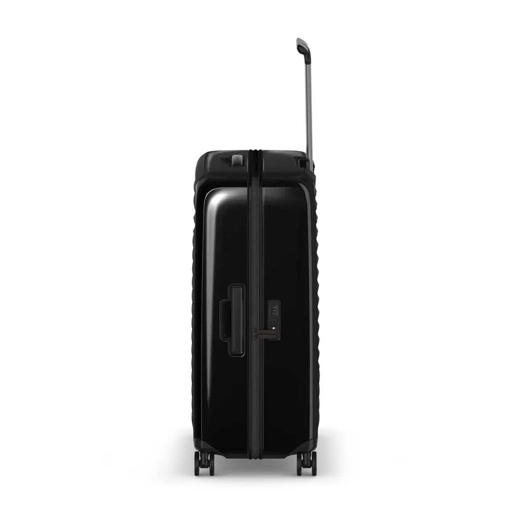 Black hardshell rolling suitcase with an extendable handle.