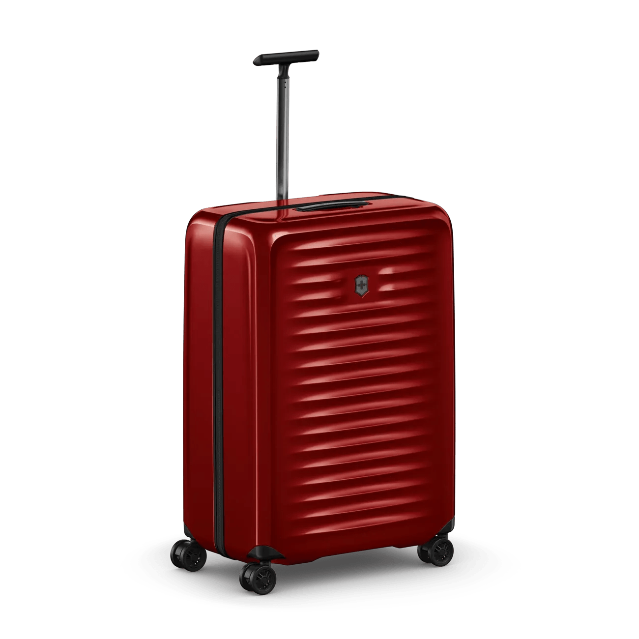Red hardshell rolling suitcase with horizontal ridges and a retractable handle.