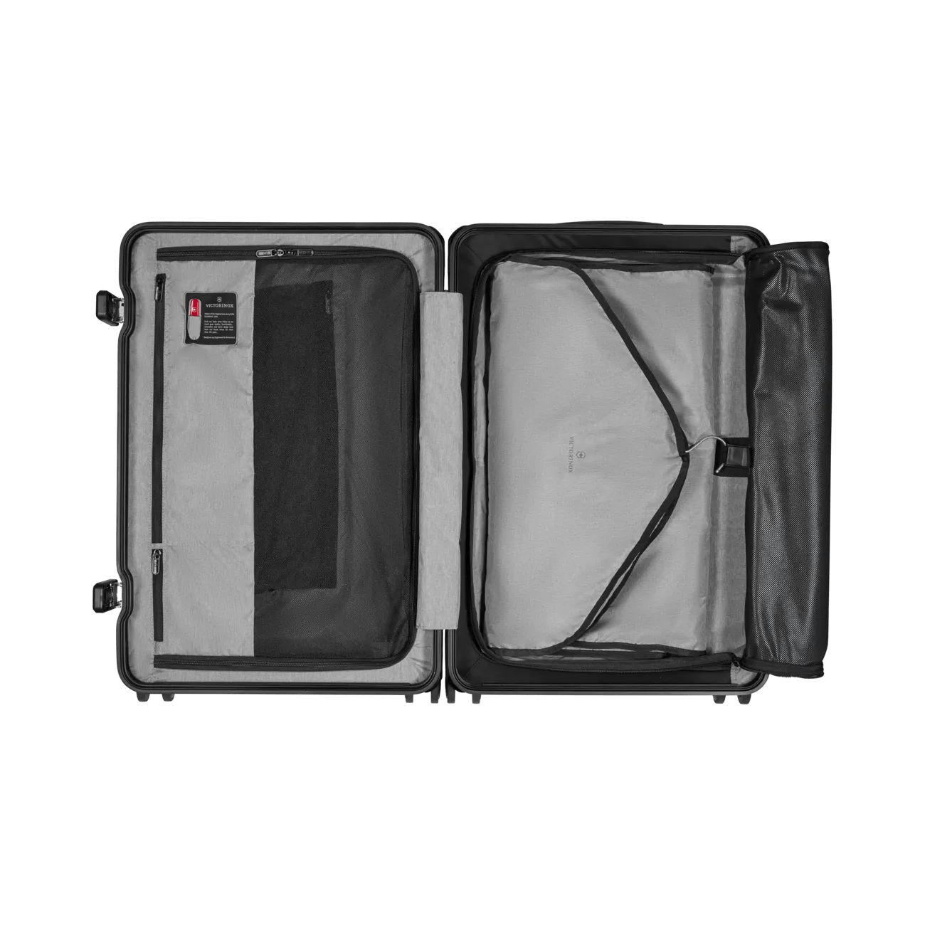 Open suitcase with compartments and straps for organizing contents.