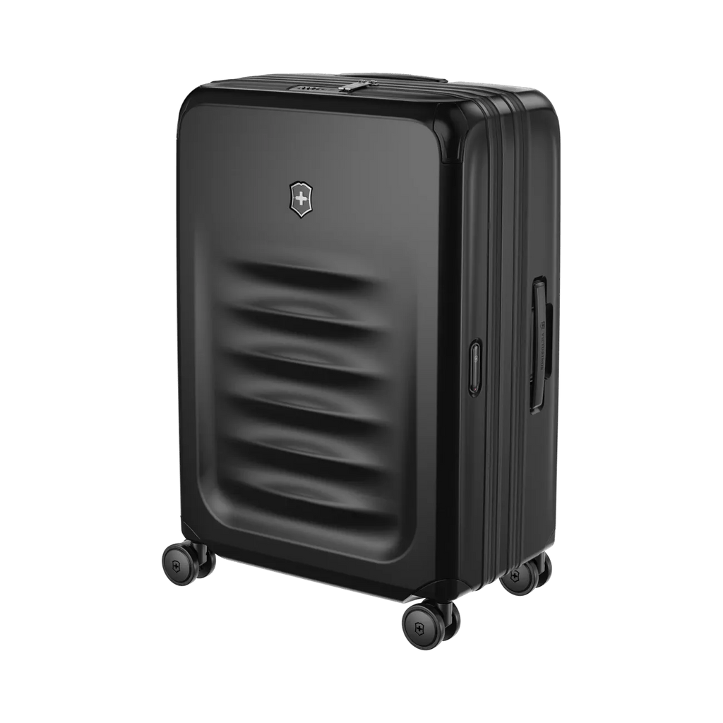 Black hardshell rolling suitcase with horizontal ridges on the front panel.