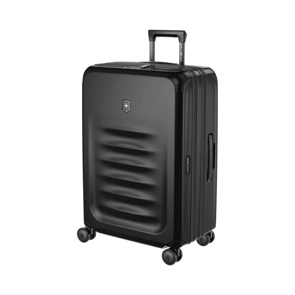 Black hardshell rolling suitcase with horizontal ridges on the front.