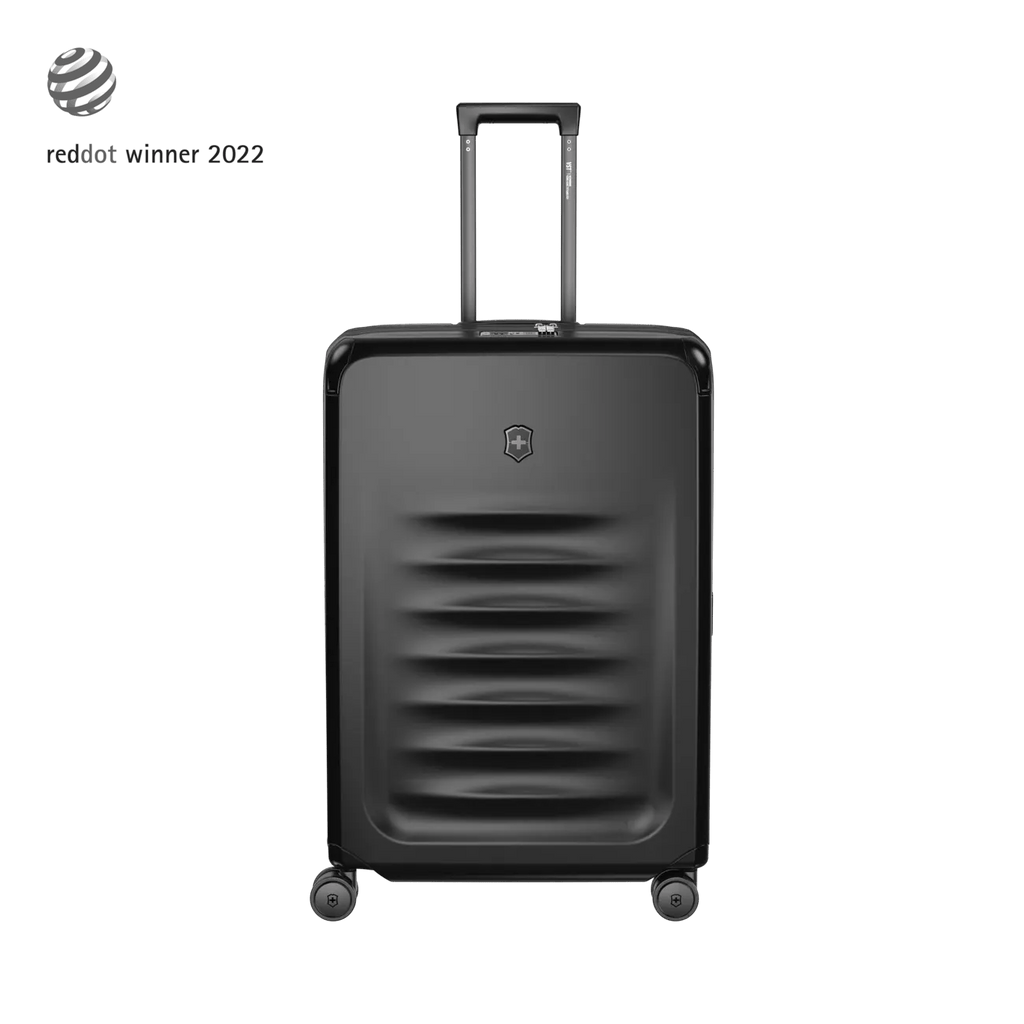 Black hardshell suitcase with horizontal ridges and a retractable handle.