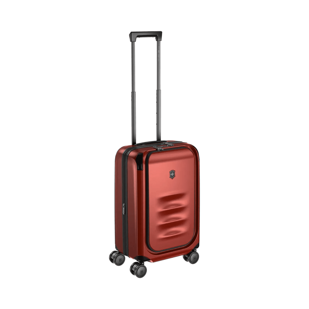 Red hardshell carry-on suitcase with telescoping handle and wheels.