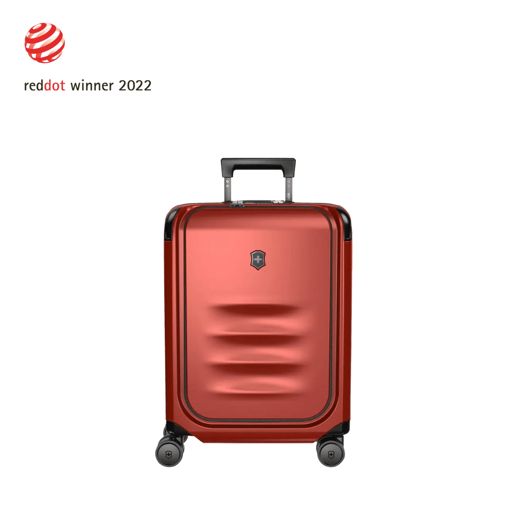 Red hardshell rolling suitcase with horizontal ridges on the front.