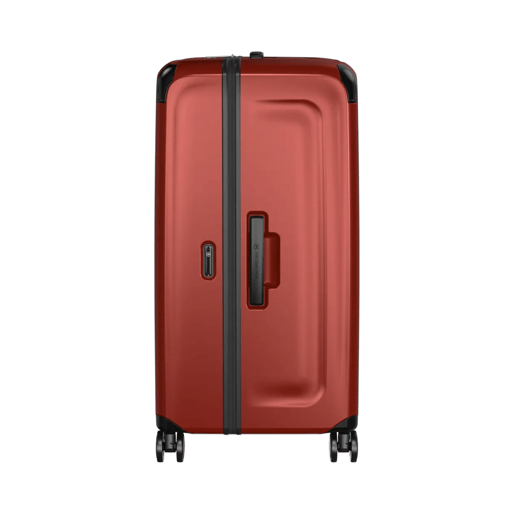 Red hardshell rolling suitcase with black trim and wheels.