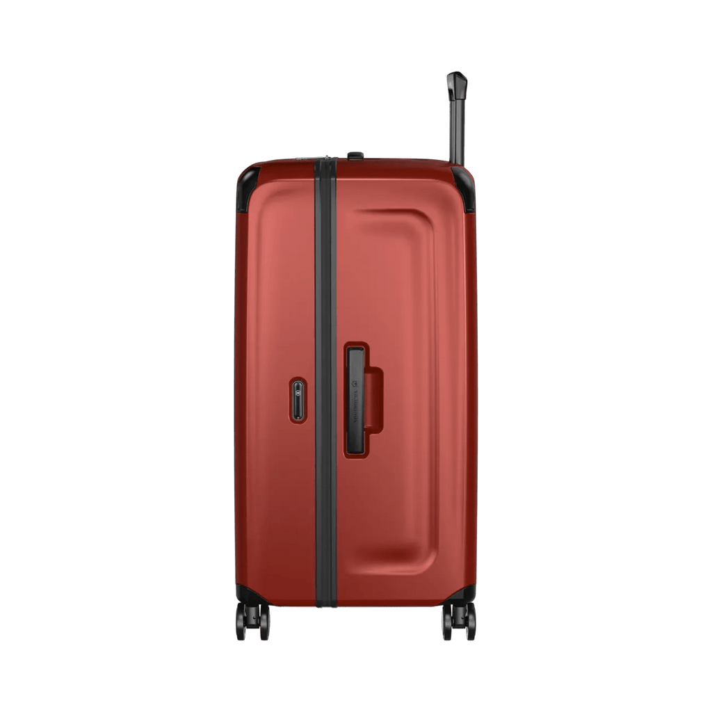Red hardshell rolling suitcase with black trim and wheels.